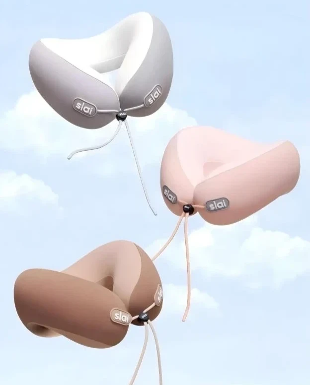 SLAI travel pillows floating in a blue sky